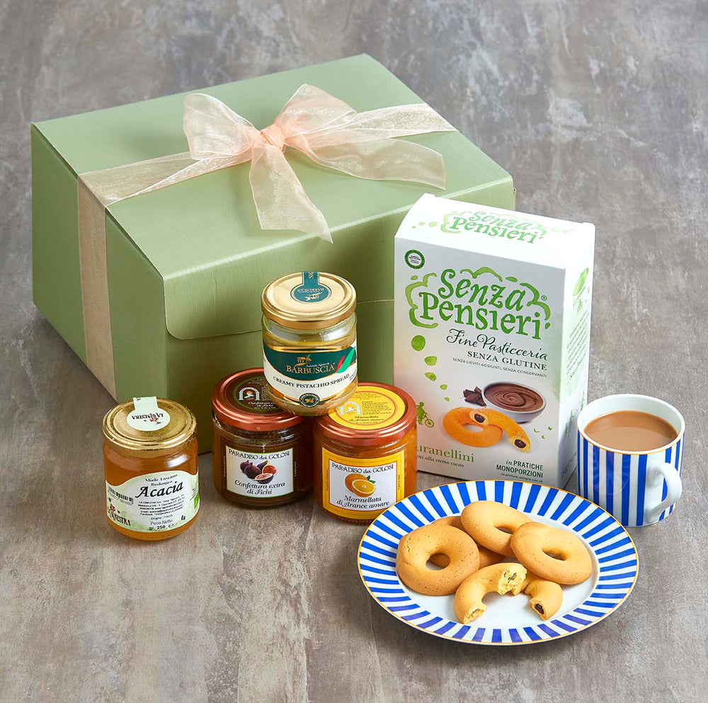 Italian breakfast hamper with jam, honey and pistachio spread and biscuits.